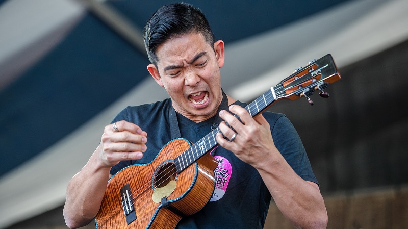 Ukulele Player On Stage