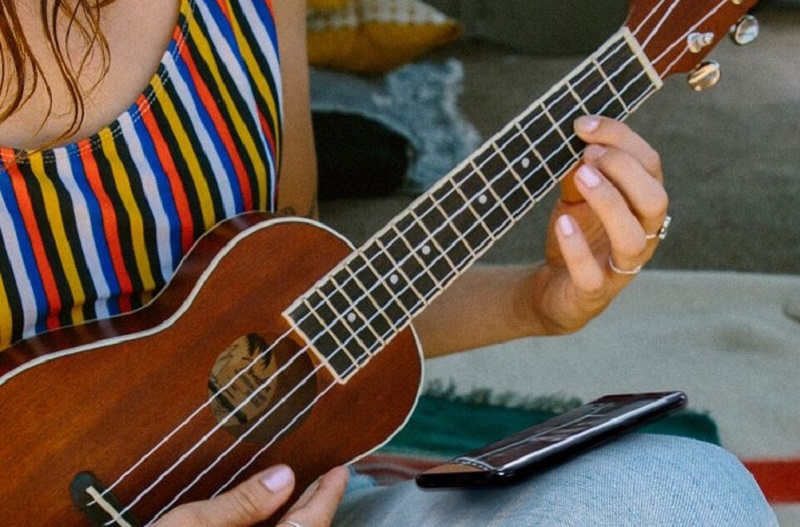 Strumming a Ukulele