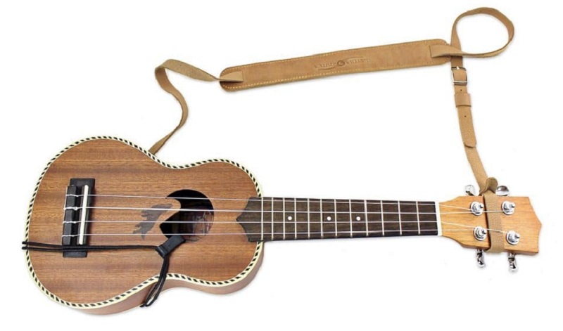 Ukulele with strap