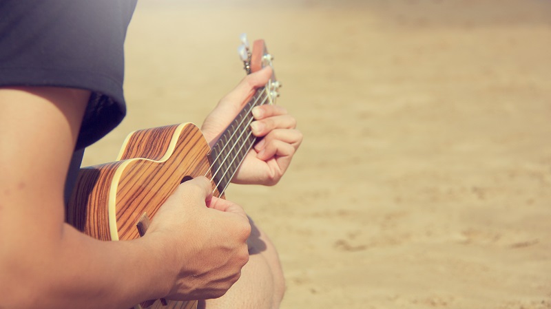 playing ukulele