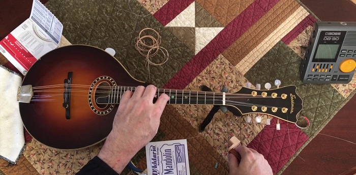 changing the strings of the mandolin