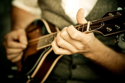 Strumming mandolin