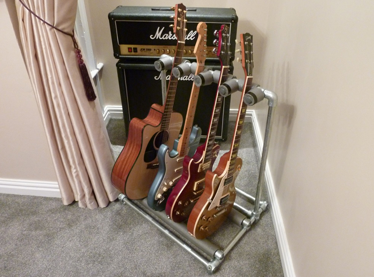 DIY ukulele stand from metal pipes