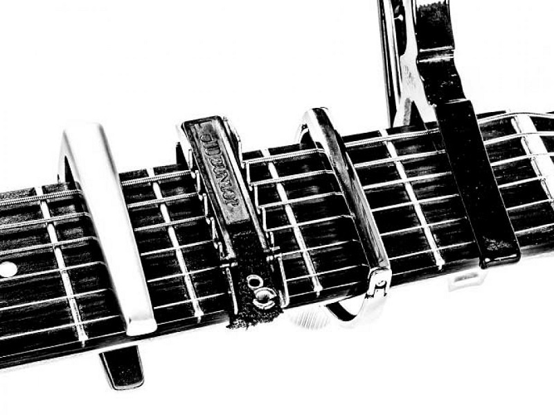 capos on fretboard